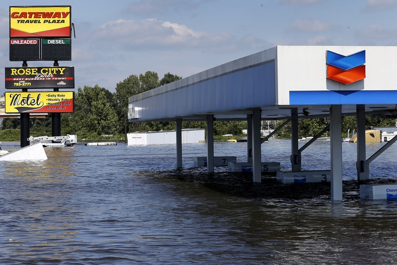 A gas station submerged under flood waters from Tropical Storm Harvey is seen in Rose City Texas U.S