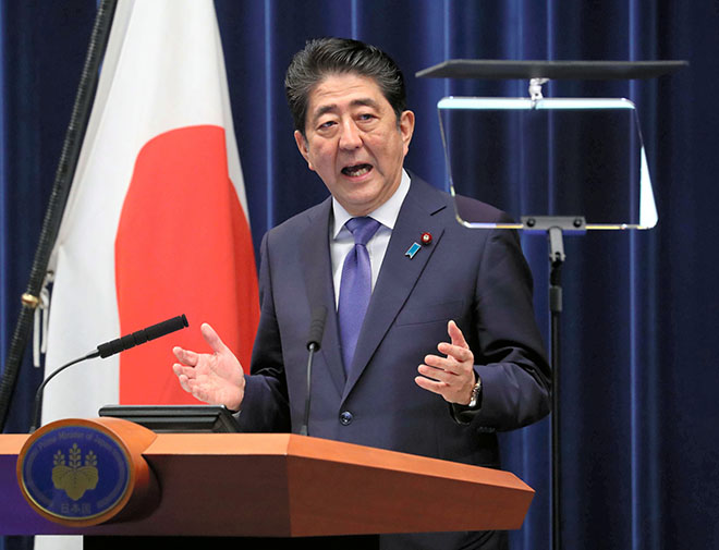 Japan's Abe promises 'daring' policies to boost economy