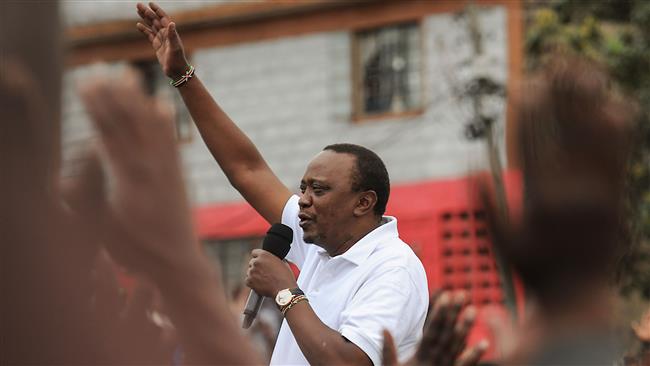 Kenya's incumbent President Uhuru Kenyatta addresses a crowd in a Nairobi suburb