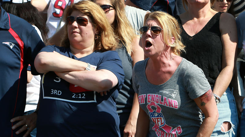 New England Patriot fans heckle NFL players taking a knee during the national anthem