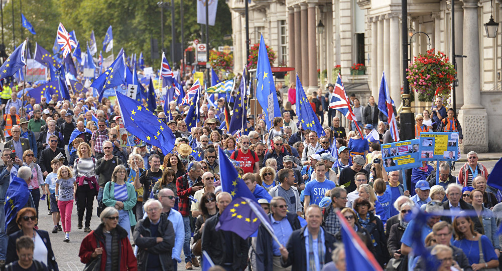 Demonstrators make their way along Piccadilly in London Saturday Sept. 9 2017 protesting Britain’s plans to withdraw from the European Union