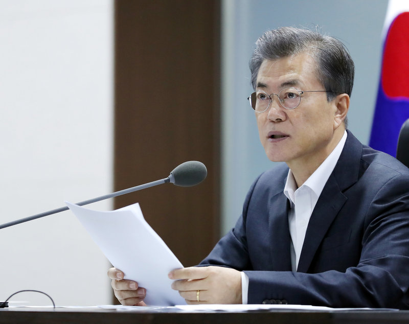 South Korean President Moon Jae-in presides over the National Security Council at the Presidential Blue House in Seoul