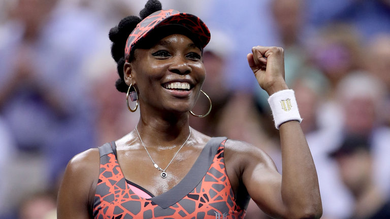 Venus Williams celebrates after securing a place in the last four