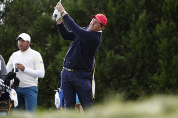 Phil Mickelson tees off on the tenth hole