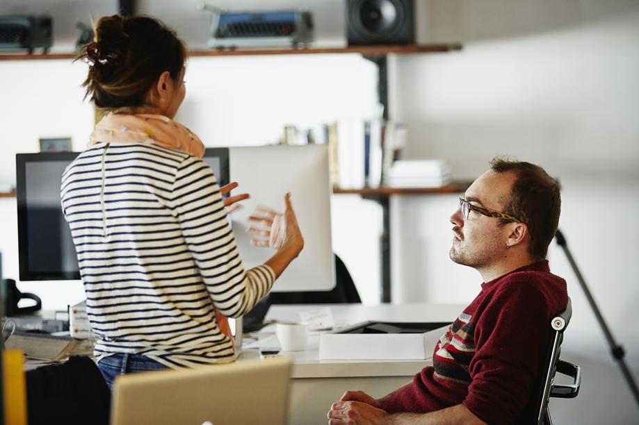 Getty Images A man listens to a woman talking