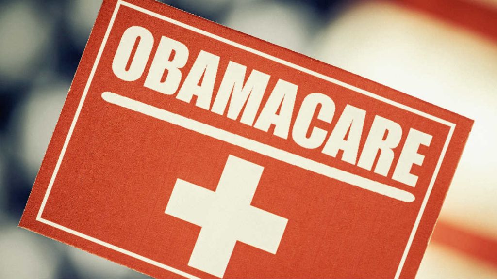 Obamacare sign with medical cross