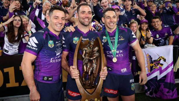 Melbourne Storm'big three Cooper Cronk Cameron Smith and Billy Slater pose with the Provan Summons Trophy after