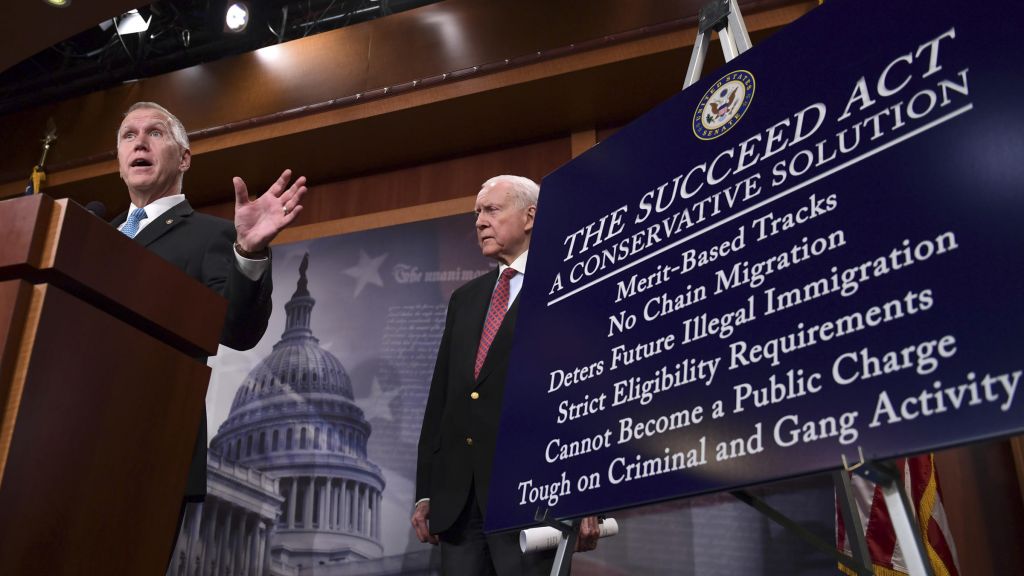 Sen. Thom Tillis R-N.C.  standing with Sen. Orrin Hatch R-Utah  talk about the SUCCEED Act during a Monday news conference on Capitol Hill. Their proposal is aimed at protecting the legal status of hundreds of thousands of immigrants brou