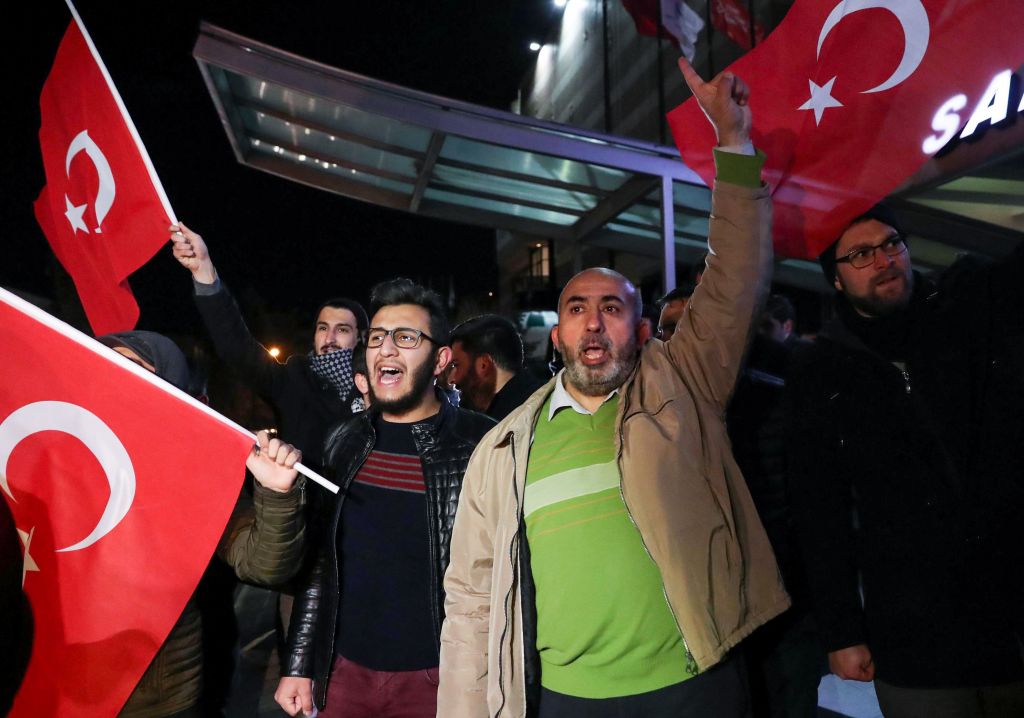 Demonstrators protest next to the US embassy in Ankara on Dec. 6 2017 after U.S. president recognised the disputed city of Jerusalem as Israel's capital