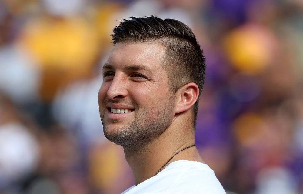 NATION-NOW     Tebow says Wisconsin isn't a top four team     
       Tebow says Wisconsin isn't a top four team