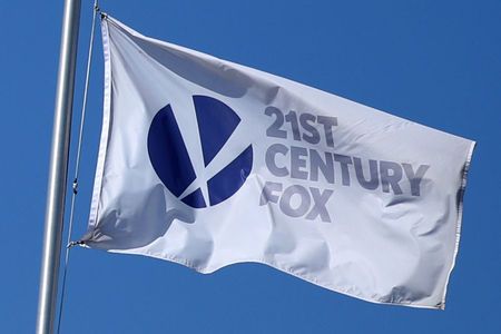 The Twenty First Century Fox Studios flag flies over the company building in Los Angeles