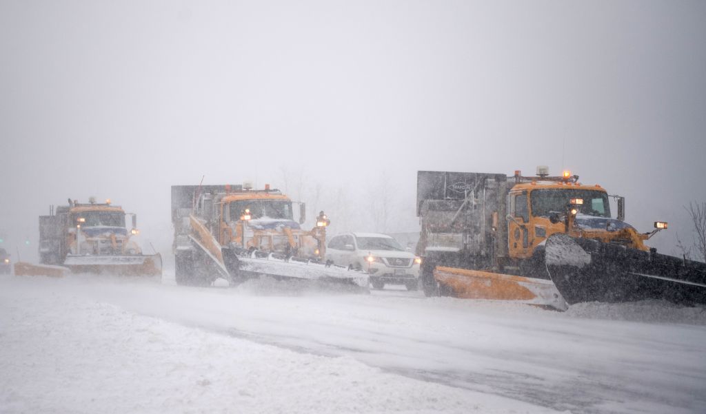 Trucks plow Rt. 112 as a blizzard hits the Northeastern part of the United States on Jan. 4 2018 in Medford New York