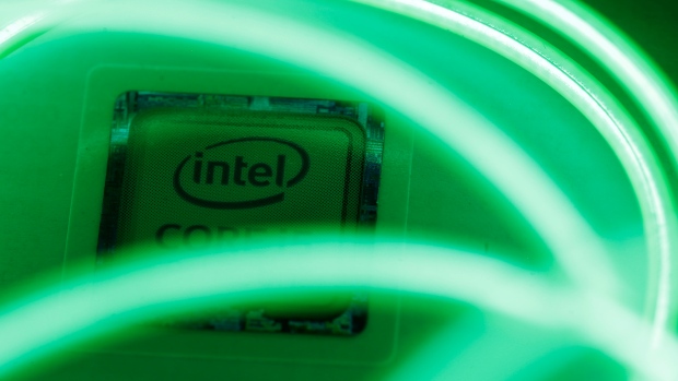 Intel logo is seen behind LED lights in this illustration taken