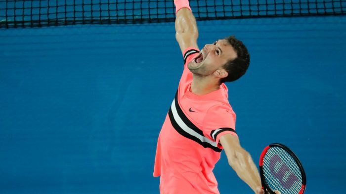 Grigor Dimitrov roars with delight after overcoming Nick Kyrgios in four sets