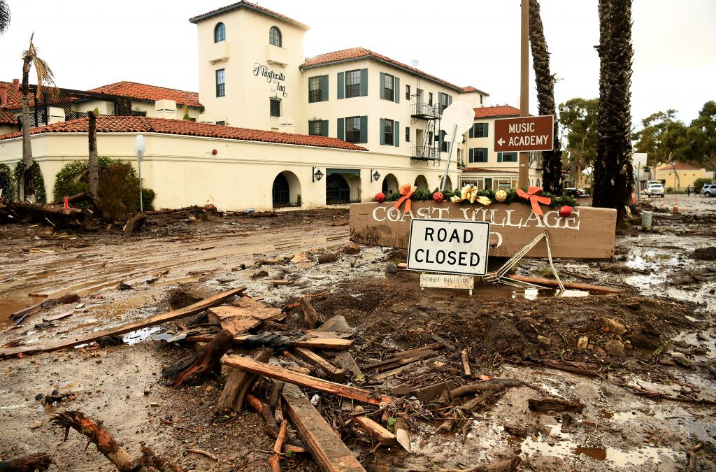 Mud and debris gather outside the Montecito Inn along Olive Mill Road in Montecito after a major storm hit the burn area