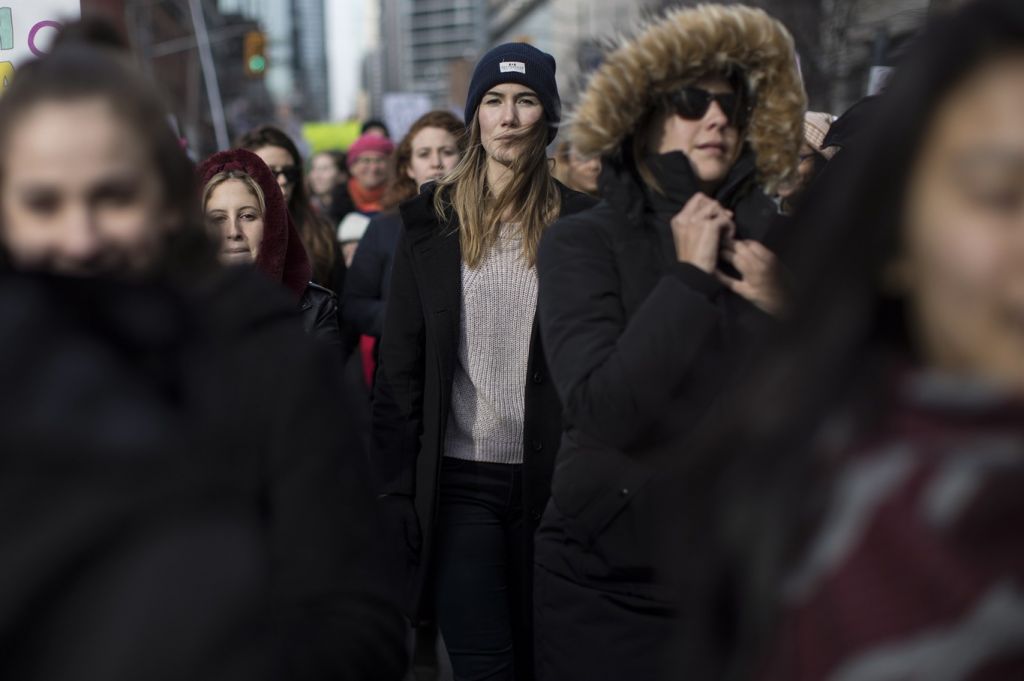 People participate in a Women's March in Toronto on Saturday