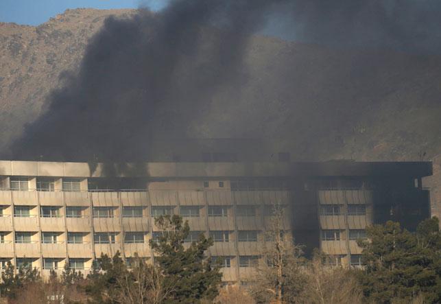 Smoke rises from the Intercontinental Hotel during an attack in Kabul Afghanistan