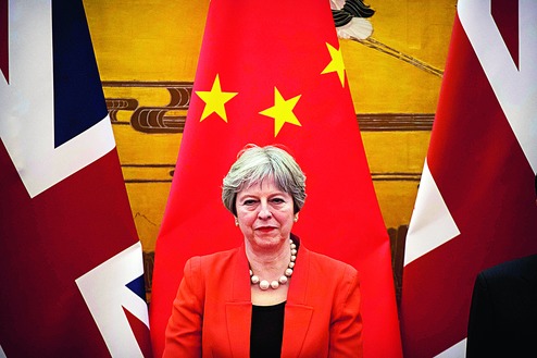 British Prime Minister Theresa May attends a signing ceremony in Beijing on Wednesday