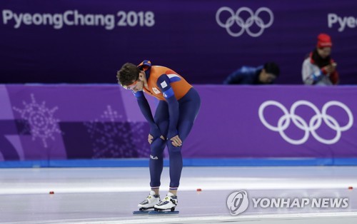 Jan Blokhuijsen of the Netherlands appears dejected after the men's team pursuit semifinal speed skating race at the Gangneung Oval at the 2018 Winter Olympics in Gangneung South Korea Wednesday Feb. 21 2018 in this Associated Press