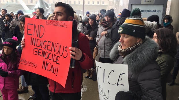 Some 200 people attended a rally at Toronto's Nathan Phillips Square to denounce the verdict