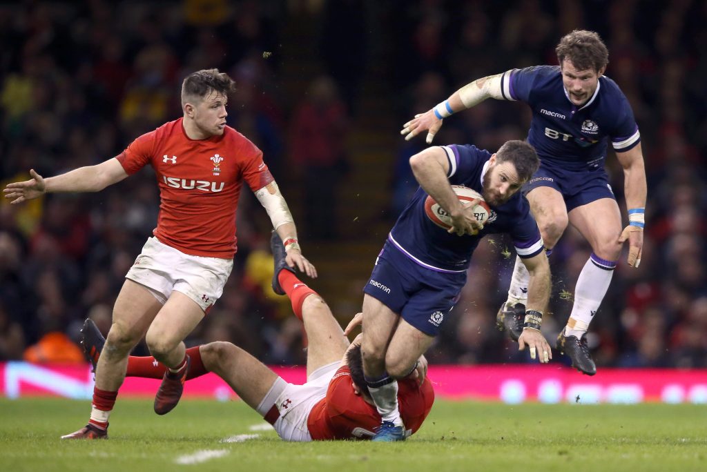 Scotland's Tommy Seymour is tackled by Wales Owen Watkin during the Nat West 6 Nations match at the Principality Stadium Cardiff