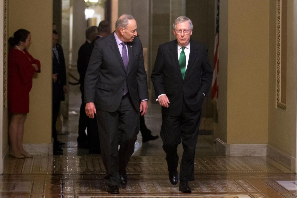 Senate Minority Leader Chuck Schumer and Senate Majority Leader Mitch Mc Connell walk to the Senate floor. Senate leaders have reached a two year budget deal adding billions of dollars in federal spending but paving the way forward to address other pendin