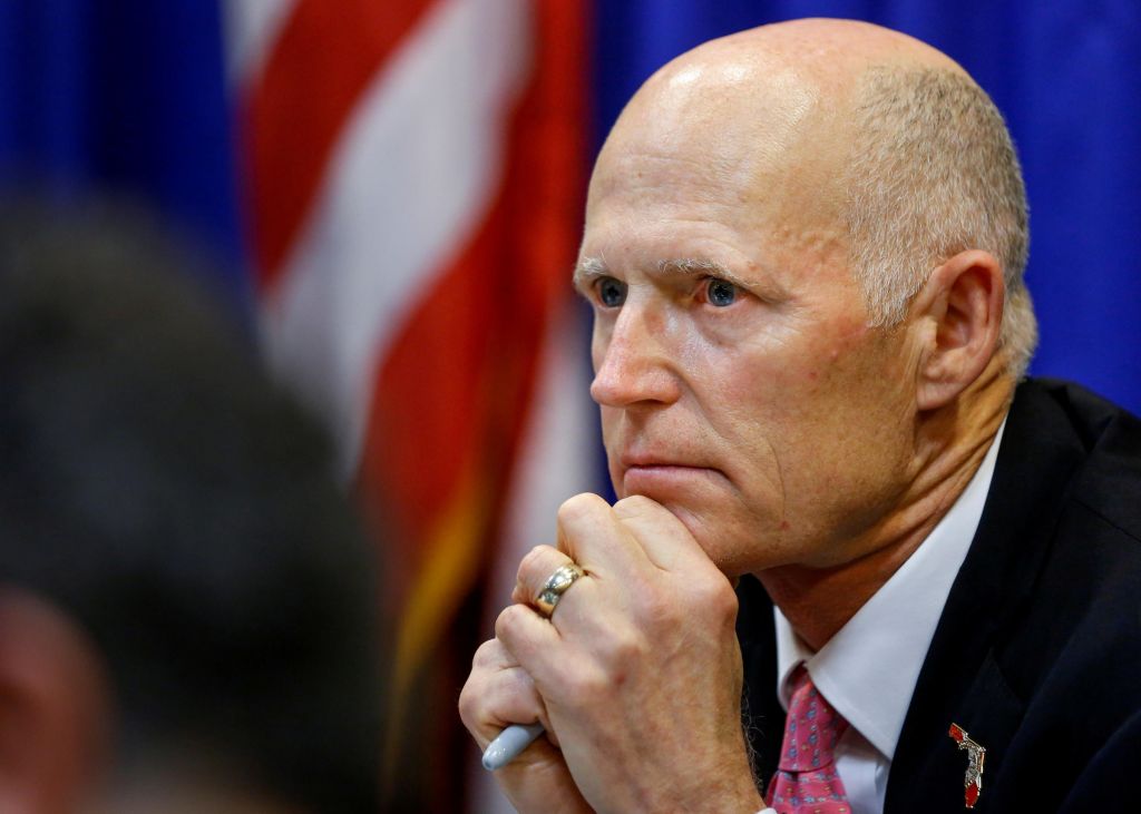 Florida Gov. Rick Scott attends a meeting at the Capitol in Tallahassee on Feb. 20. Scott met with law enforcement mental health and education officials about how to prevent future tragedies in the wake of the mass shooting at Marjory Stoneman Douglas H