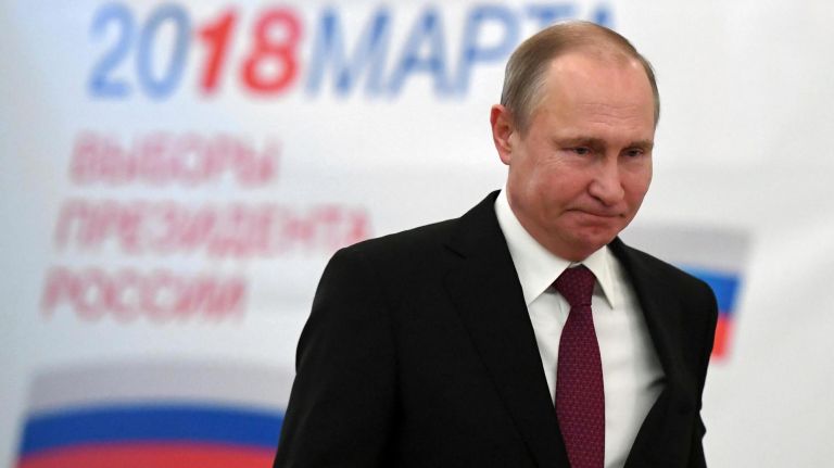 Russian President and Presidential candidate Vladimir Putin arrives