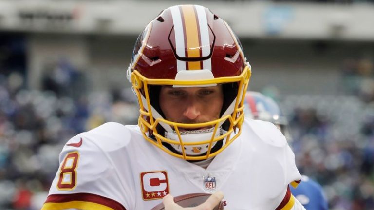 Kirk Cousins rushes for a touchdown during