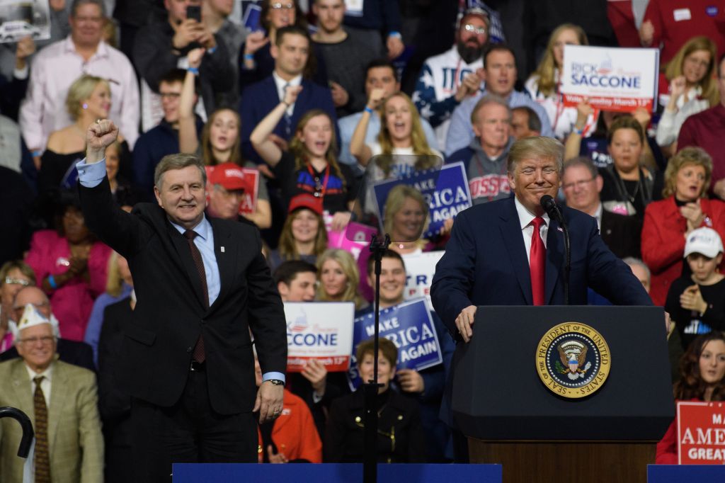 President Donald J. Trump with Rick Saccone speaks to supporters at the Atlantic Aviation Hanger