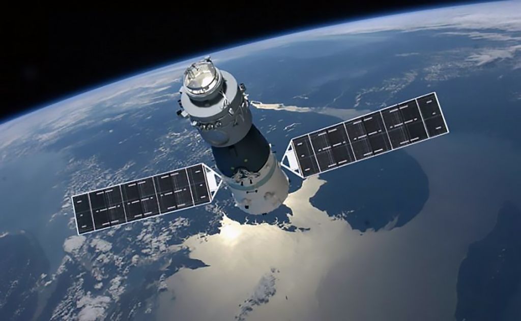 An illustration of China's first space station Tiangong-1 orbiting Earth.      China Manned Space Agency