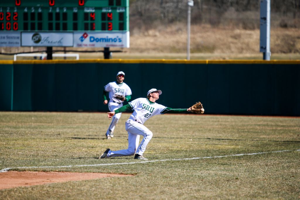 Senior second basemen Mitchell Wood stretches to record an out versus Seton Hill. Wood has started all 16 of his team's games this season