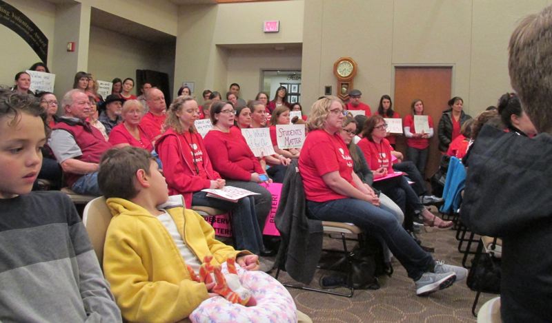 It was standing room only at the April 11 Reynolds School Board meeting as teachers protested possible staff reductions that would boost class sizes