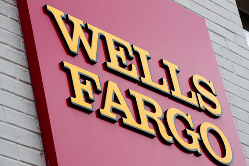 Wells Fargo to pay $1B for mortgage auto lending abuses