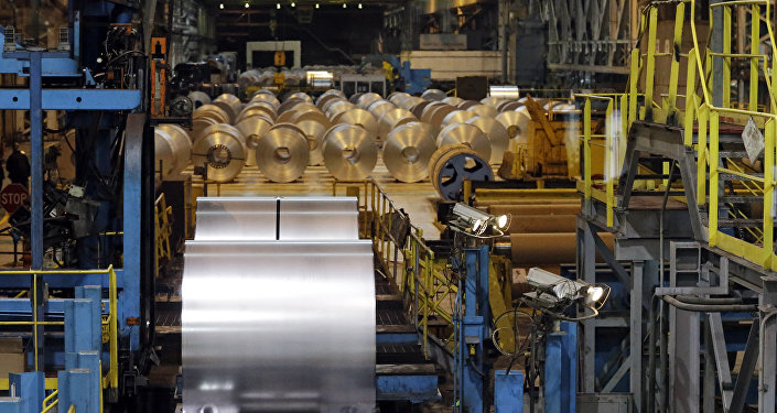 Finished galvanized steel coils await roll of the hot dip galvanizing line at Arcelor Mittal Steel in Cuyahoga Heights Ohio Friday Feb. 15 2013