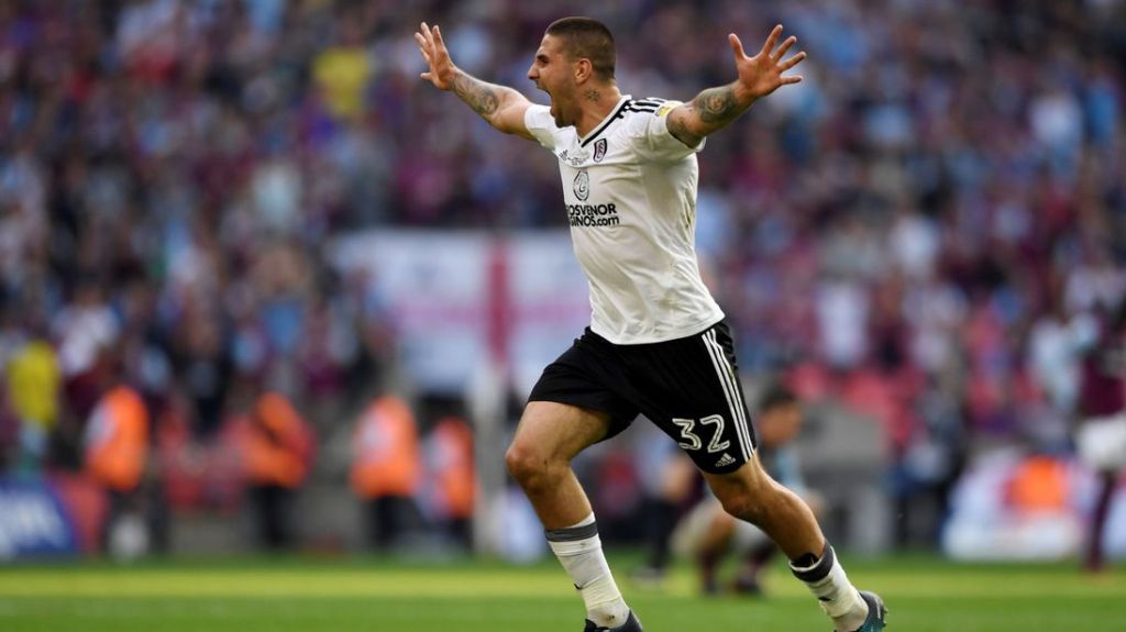 Fulham's Aleksandar Mitrovic celebrates promotion to the Premier League