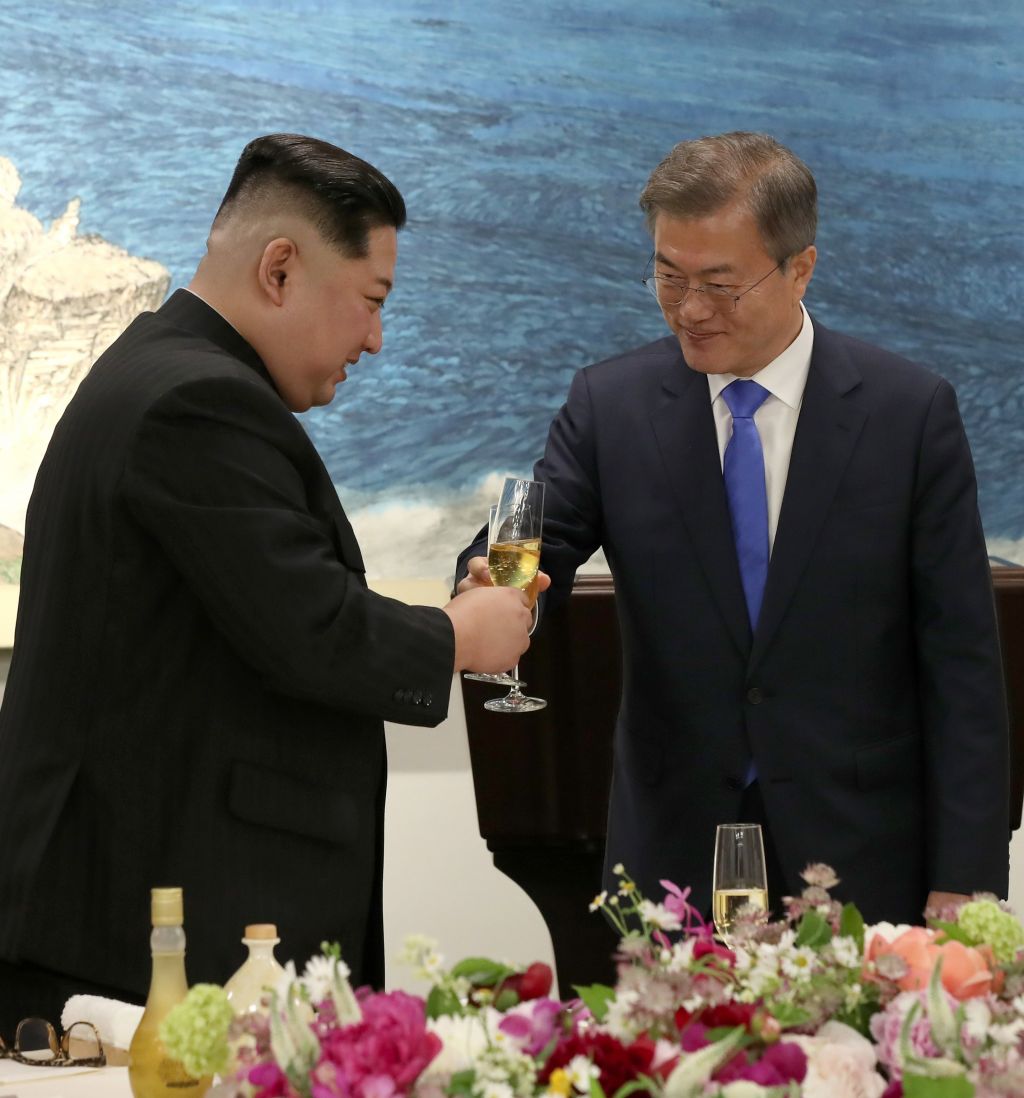 Kim Jung-un and President Moon toast each other at the summit in the border village of Panmunjom last week