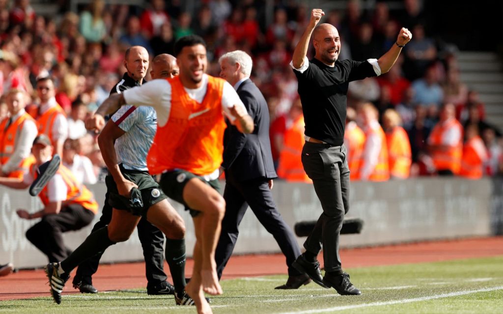 Kyle Walker runs to celebrate