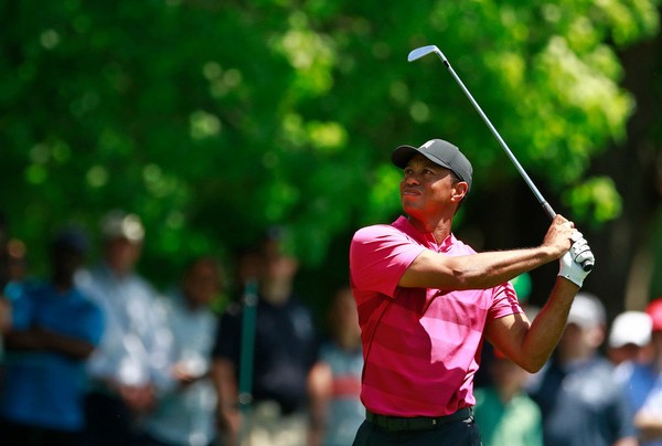 Tiger Woods watches an approach shot during the first round of the PGA Tour's Wells Fargo Championship 2018