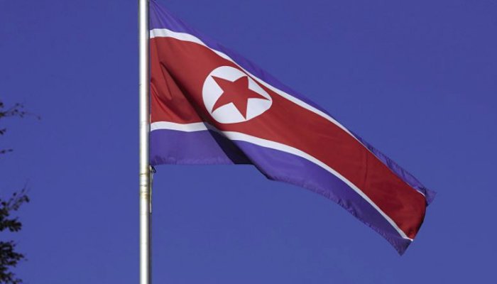 A North Korean flag flies on a mast at the Permanent Mission of North Korea in Geneva Switzerland