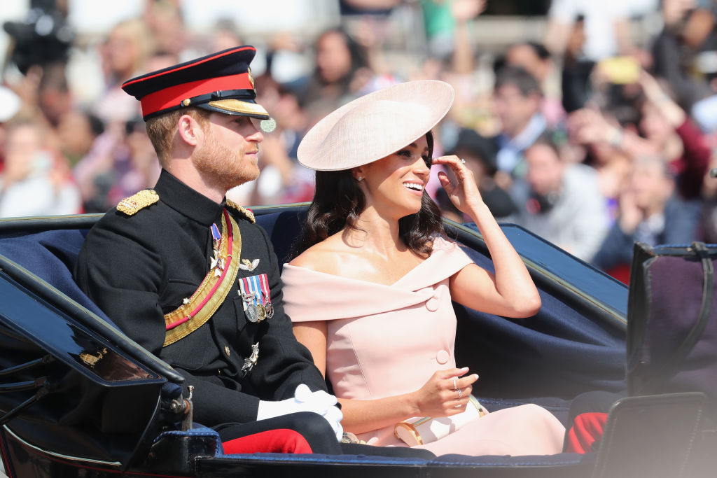 LONDON ENGLAND- JUNE 09 Prince Harry Duke of Sussex and Meghan Duchess of Sussex during Trooping The Colour on the Mall