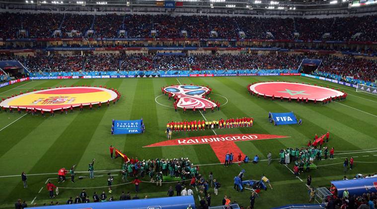 General view as Spain and Morocco players line up during the national anthems before the match