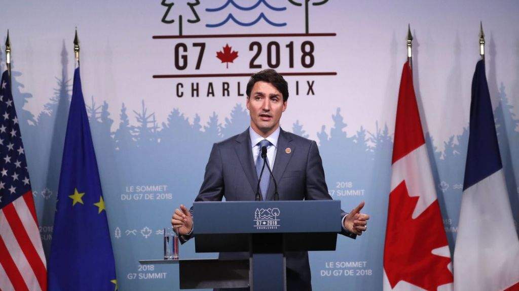 Canada's Prime Minister Justin Trudeau addresses the final news conference of the G7 summit in the Charlevoix city of La Malbaie Quebec Canada