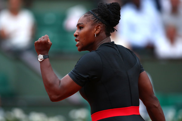 ImageErasing a deficit of a set and a break Serena Williams roared back to defeated Ash Barty 3-6 6-3