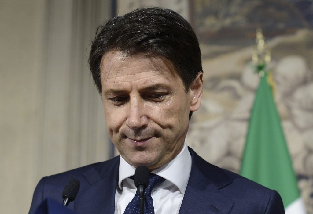 Italy in crisis as Prime Minister is forced to quit after four days in power