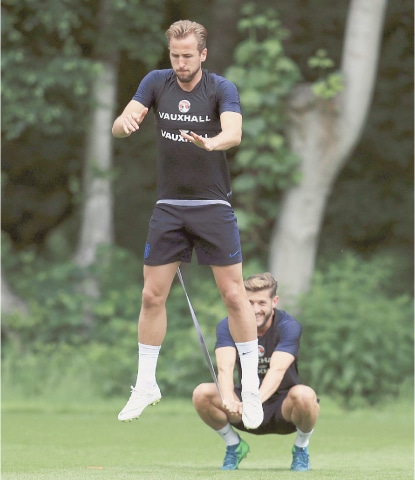 LONDON England’s Harry Kane and Adam Lallana attend a training session on Friday ahead of their international friendly against Nigeria.—AP