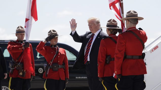 President Donald Trump arrives for the G7 Summit Friday