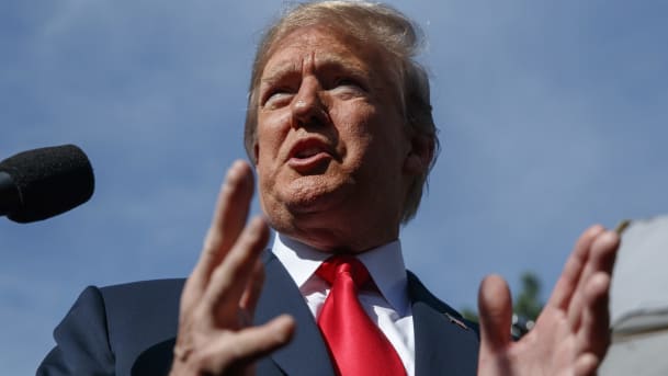 President Donald Trump speaks to reporters at the White House