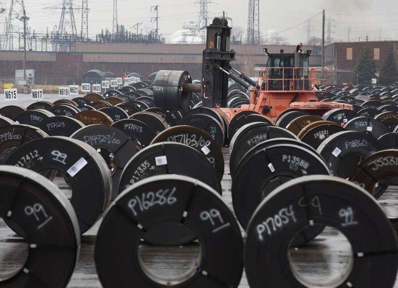 Rolls of steel are moved outside the Arcelor Mittal Dofasco plant an integrated steel producer in Hamilton Ontario Canada