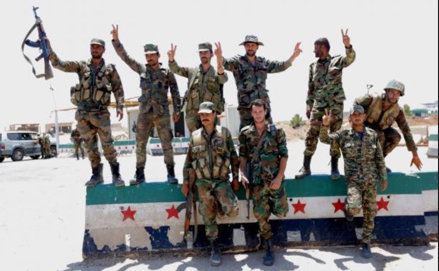 Syrian forces reach Jordanian border crossing as rebels negotiate surrender